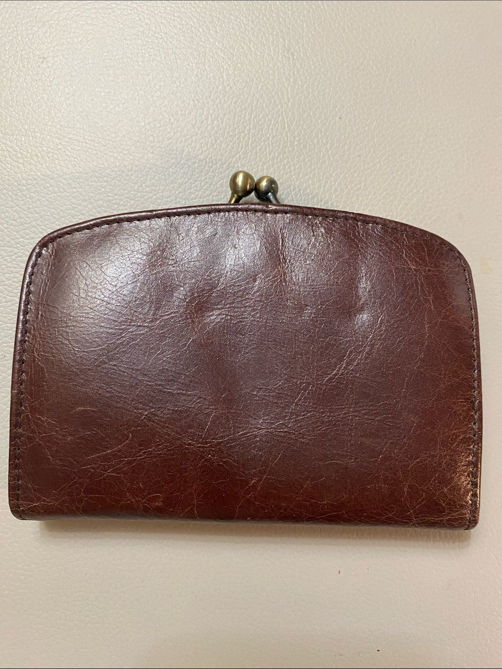 Vintage Brown leather Hobo Wallet with kiss lock coin area.